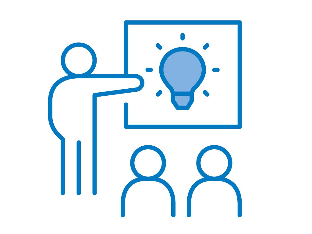 Icon mit zwei Personen, die einer weiteren Person vor Flipchart zuhören. 